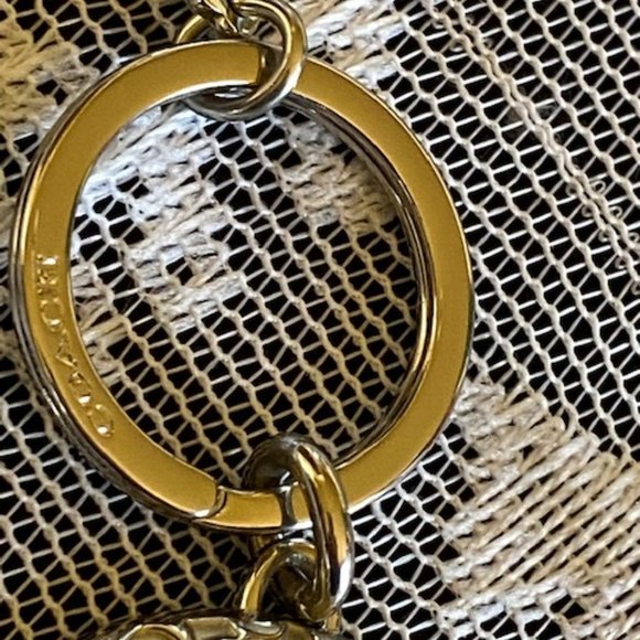 Coach Embossed Signature Logo Open Oval Shape Silver Keychain - Picture 9 of 13